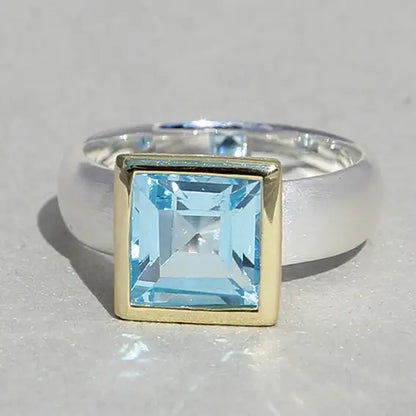 Kucho Blue Topaz Silver Ring, Setting Gold-Plated